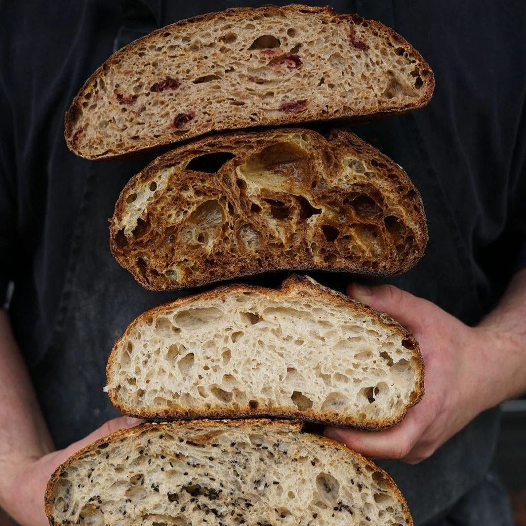 Assortment of freshly baked breads and pastries